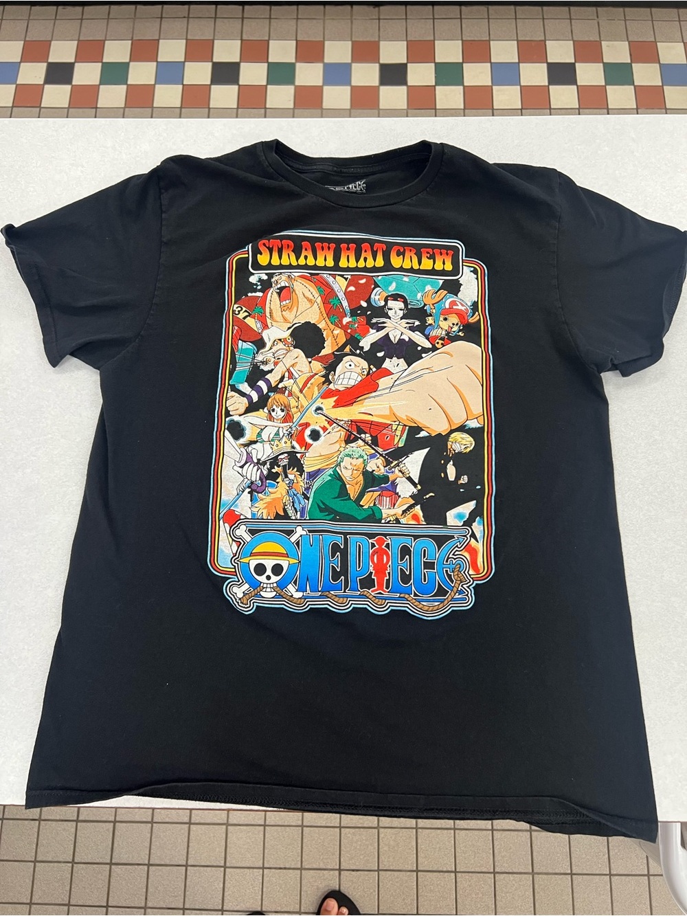 Onepiece Black Tee with Multicolor Straw Hat Crew Graphic